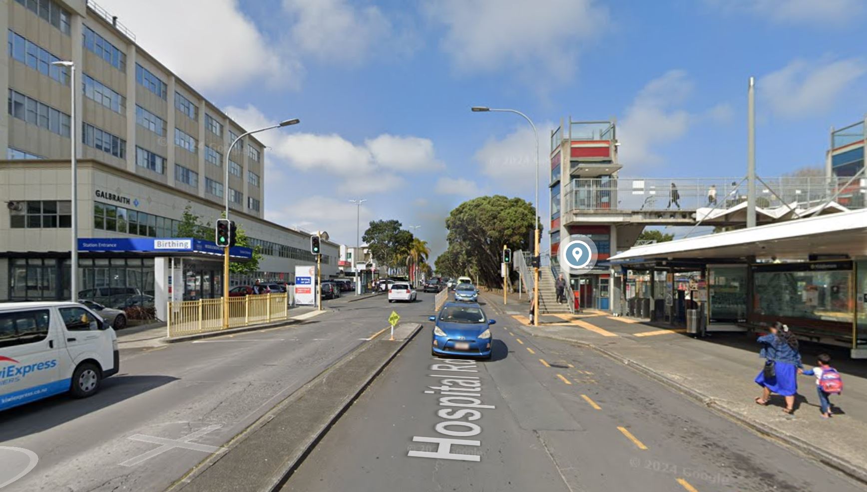Hospital Road at Middlemore showing the station entrance and hospital buildings